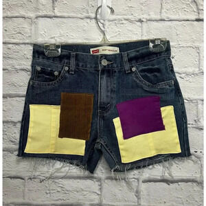 Levi’s 505 upcycled cutoff patchwork denim shorts, size 27.